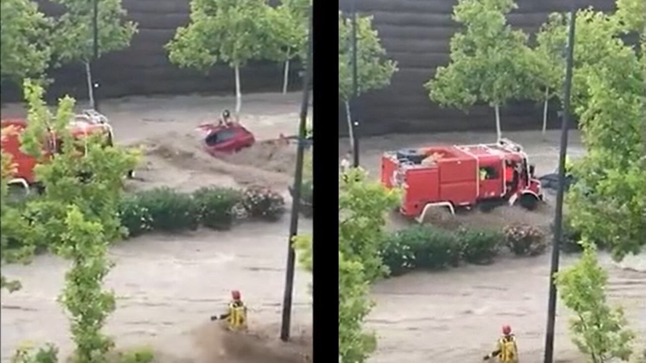Bomba d'acqua in Spagna: le persone sui tetti delle macchine ⎪ Video