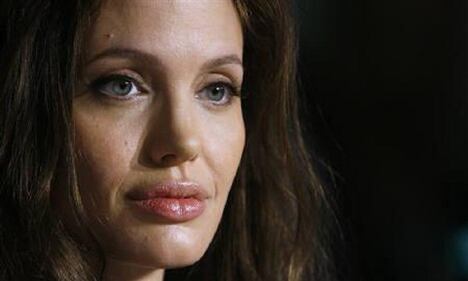 Angelina Jolie: "non ho mai pensato a me stessa come a una madre". Le foto 13