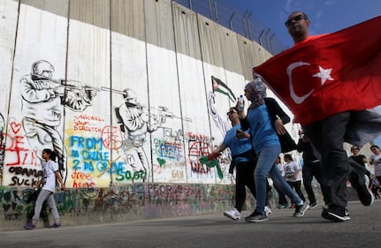 La Palestina corre contro il muro di separazione 2