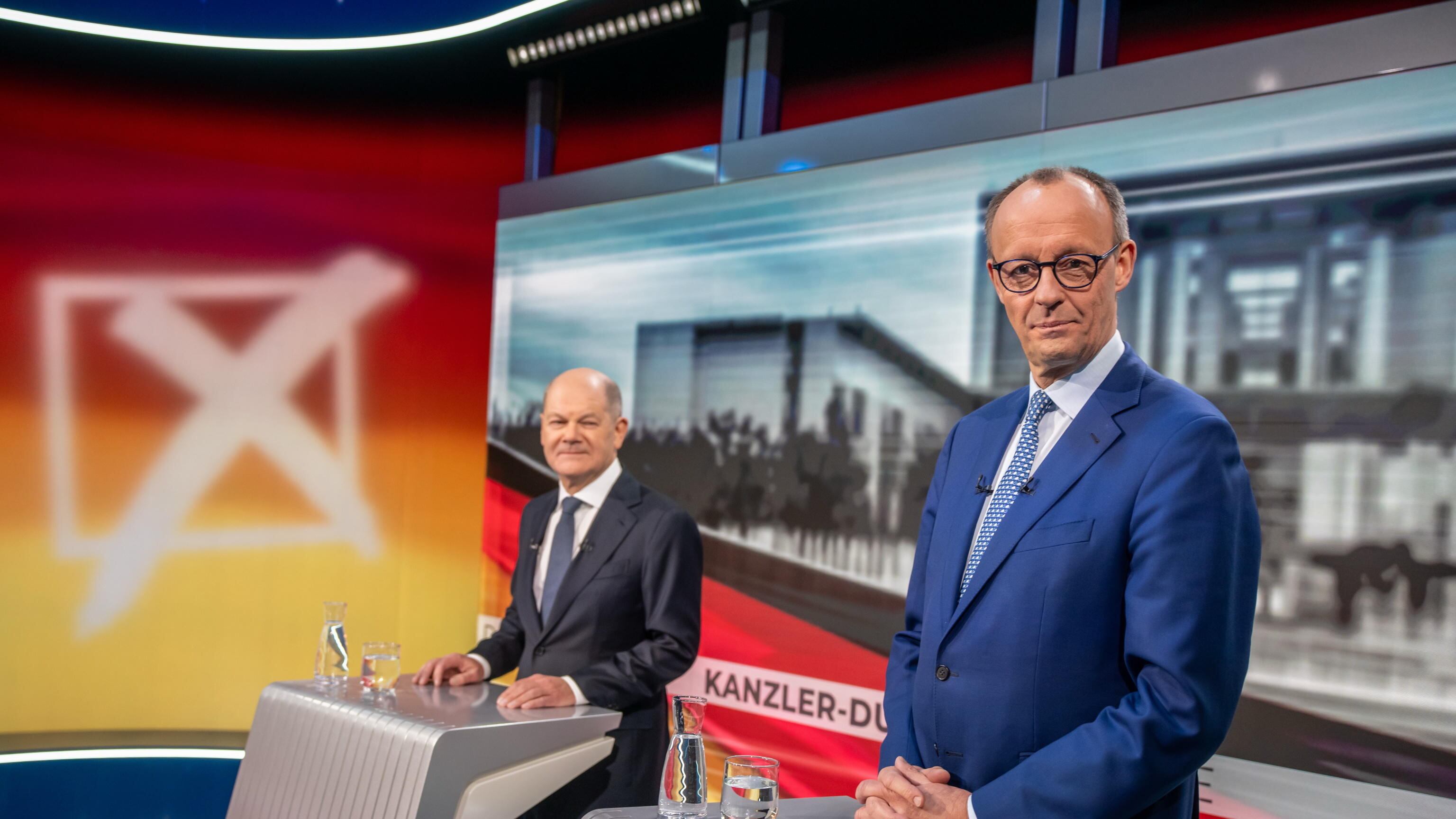 Duello Scholz-Merz. Uniti contro Donald