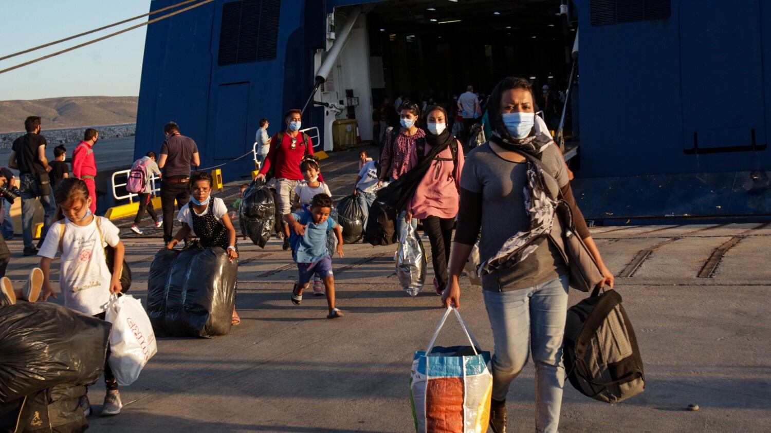 'Devono conoscere la lingua...' La nuova legge per i migranti