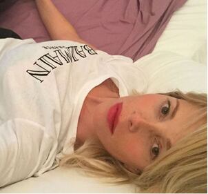 Alessia Marcuzzi sensuale in top e collant nero 13