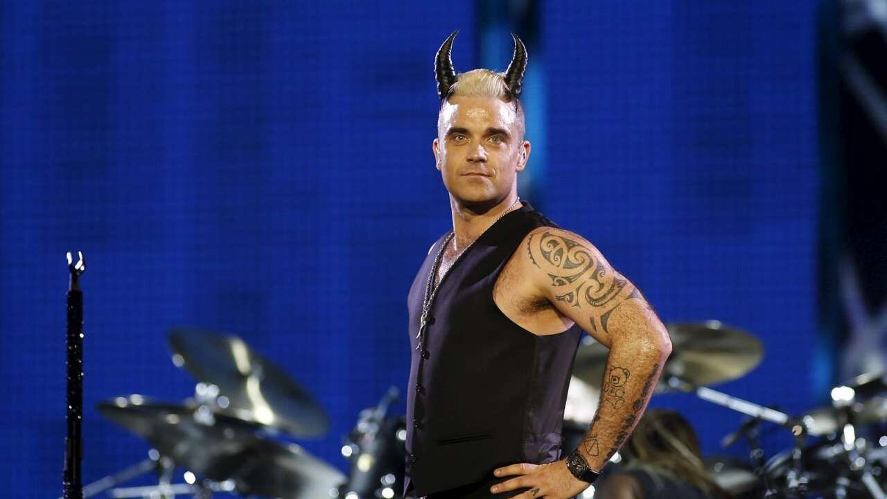 Robbie Williams e Take That: reunion possibile per l'anniversario della band?