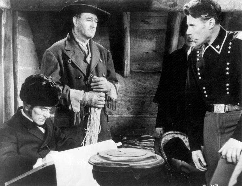John Wayne in una scena del film