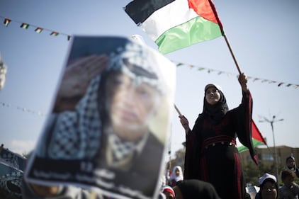I palestinesi festeggiano l'anniversario della morte di Arafat 15