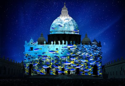School of fish projected on St. Peter's Basilica. Photography by David Doubilet. Artistic rendering by Obscura Digital