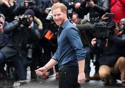 Il Principe Harry e la Regina Elisabetta II in foto 1
