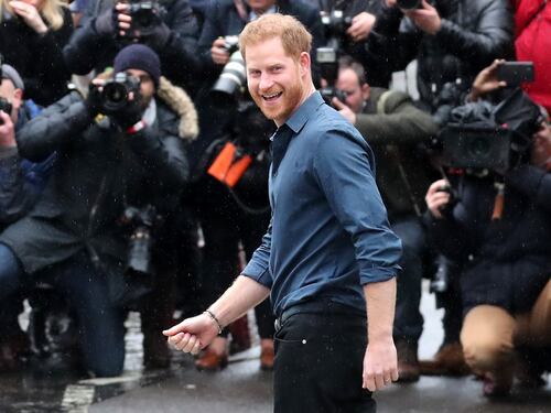 Il Principe Harry e la Regina Elisabetta II in foto