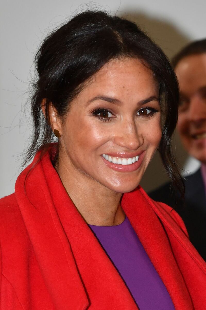 Meghan Markle in rosso per un poeta: foto 1