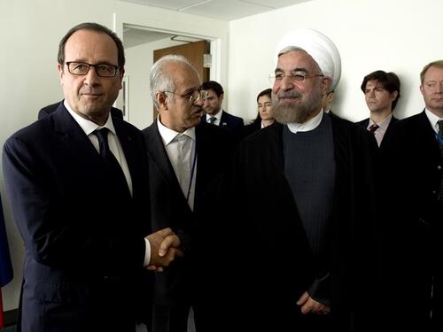 Il presidente iraniano "dà buca" a Hollande: "Niente vino a tavola"