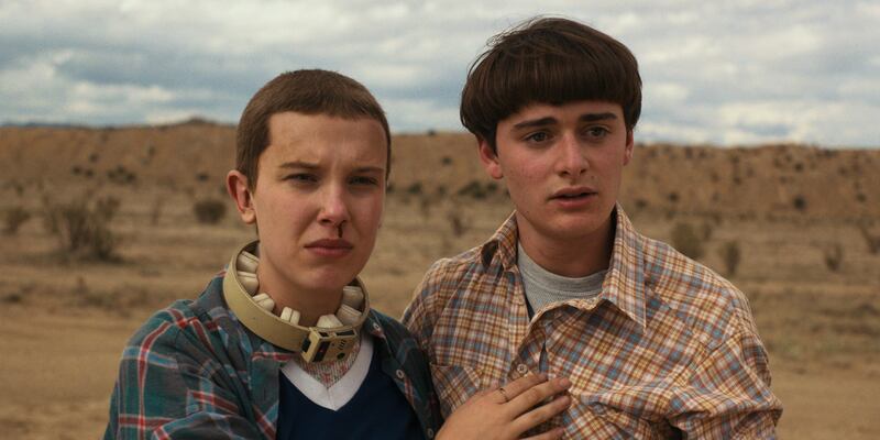 Millie Bobby Brown as Eleven and Noah Schnapp as Will Byers in Stranger Things