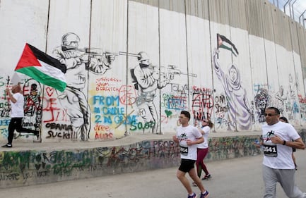 La Palestina corre contro il muro di separazione 12