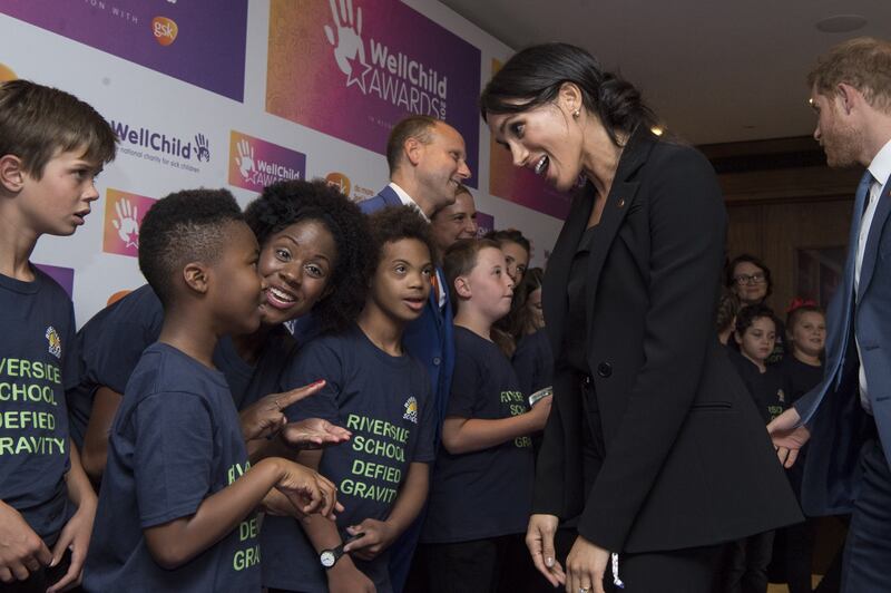 Meghan Markle e il Principe Harry tra i bimbi per beneficenza 3