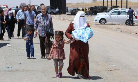 Iracheni in fuga verso il Kurdistan 2