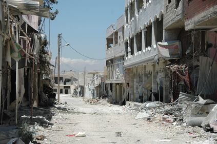 La distruzione nella città di Qusayr 7