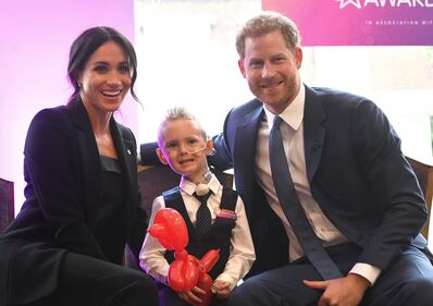 Meghan Markle e il Principe Harry tra i bimbi per beneficenza 6