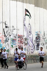 La Palestina corre contro il muro di separazione 4