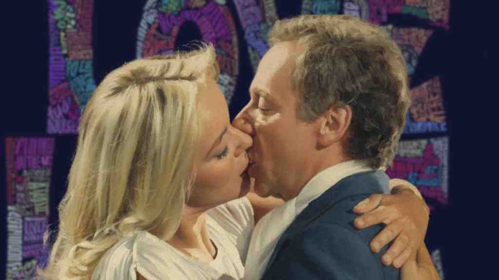 Il bacio tra Dorelli e Guida