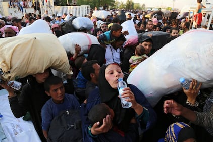 I profughi sfondano il confine tra Turchia e Siria 9