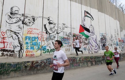 La Palestina corre contro il muro di separazione 5