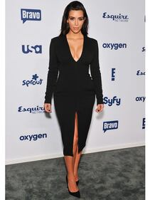 Kim Kardashian, maglietta bagnata senza reggiseno 56