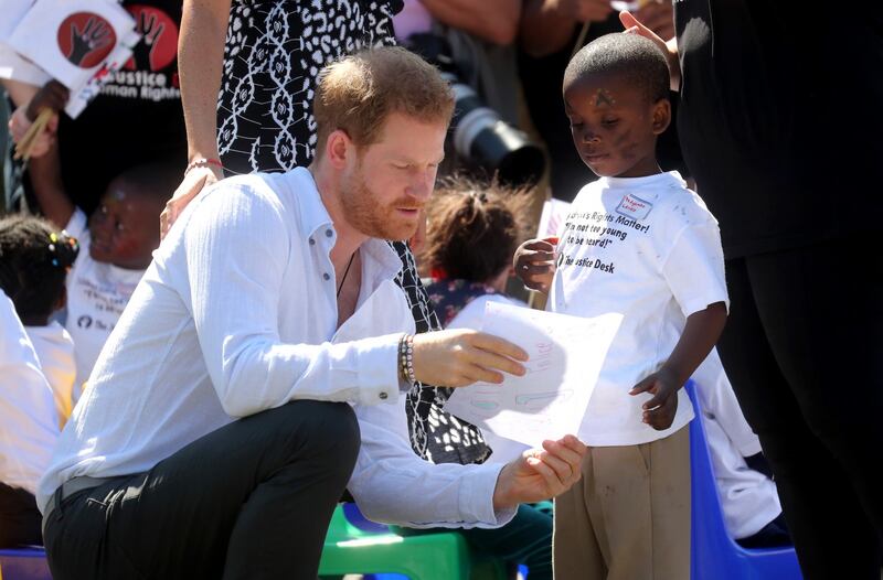 Meghan Markle e il Principe Harry arrivano in Sudafrica: foto 10