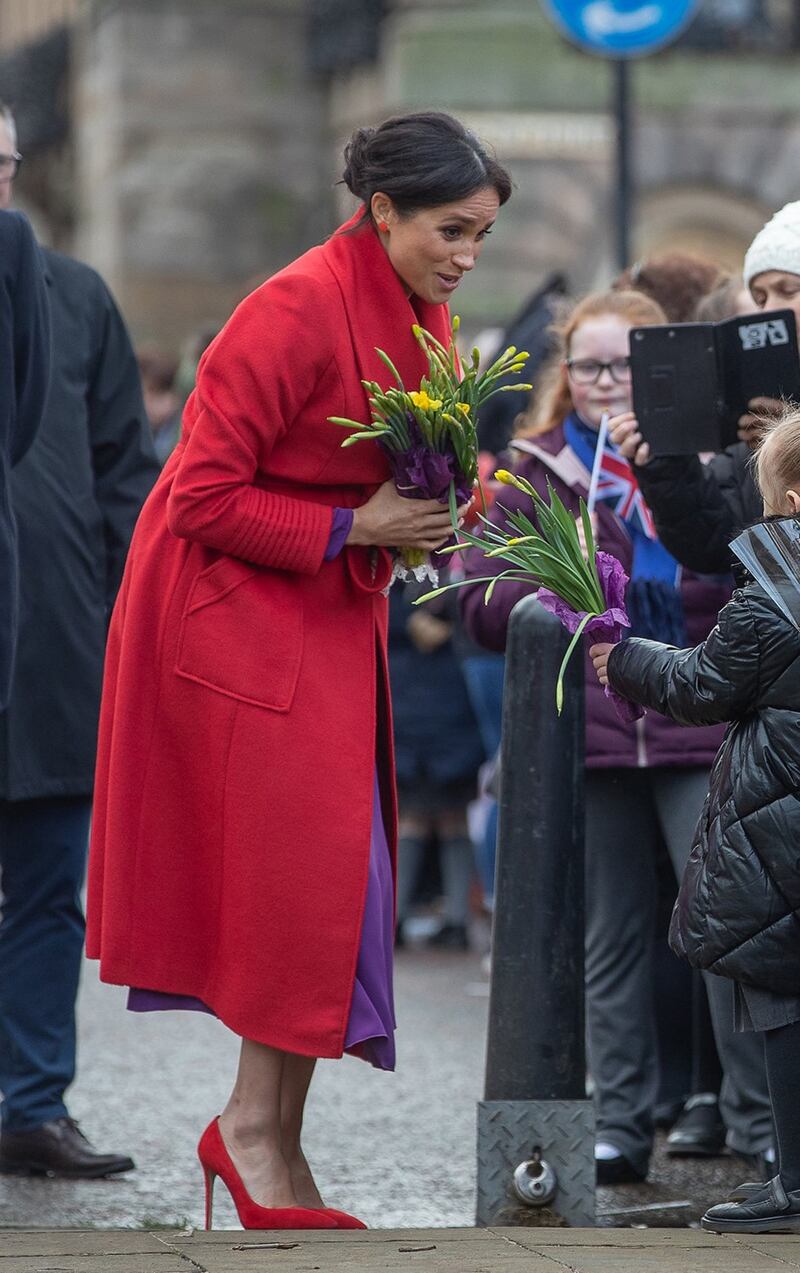 Meghan Markle in rosso per un poeta: foto 9