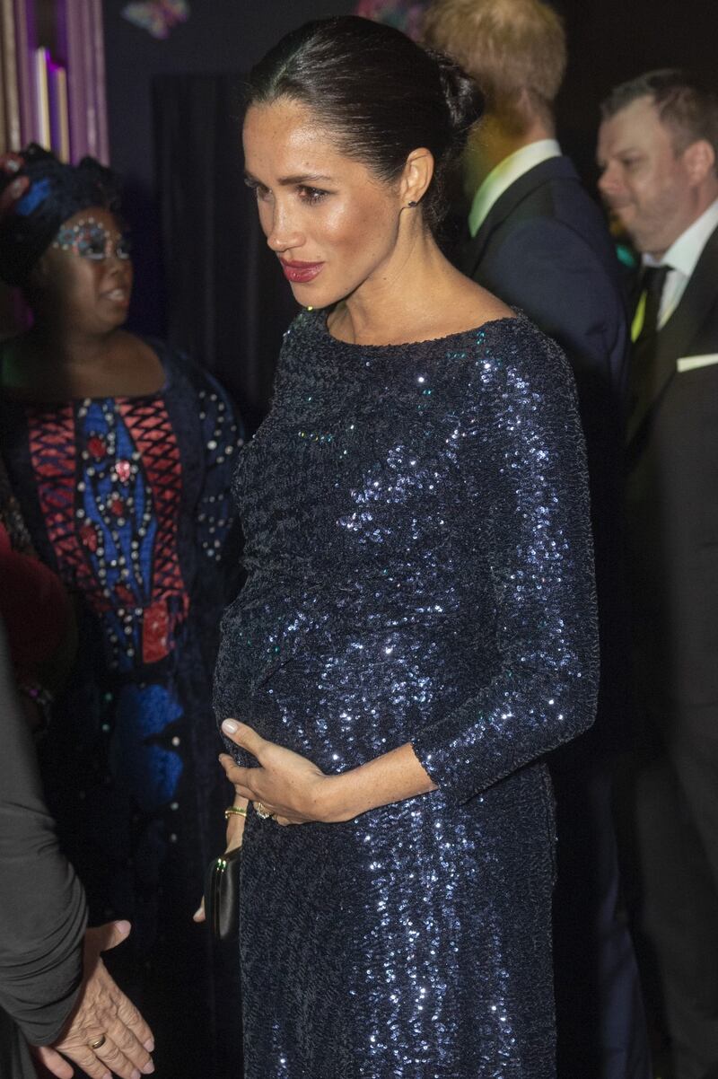 Meghan Markle raggiante col pancione: foto 9