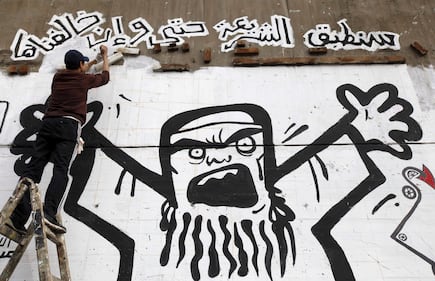 Egitto, graffiti contro Morsi 1