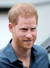Il Principe Harry e la Regina Elisabetta II in foto 2