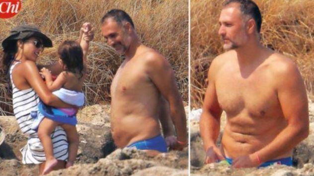 Raoul Bova (irriconoscibile e appesantito) in vacanza con la moglie