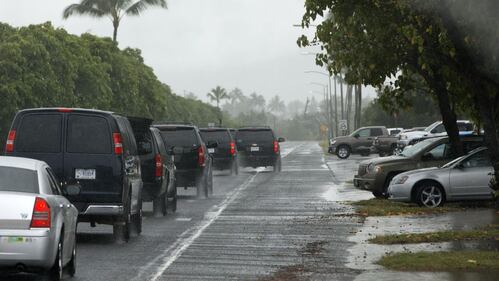 Golf e "mise" a fiori. Gli Obama alle Hawaii per Natale 6