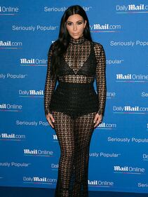 Kim Kardashian, maglietta bagnata senza reggiseno 29