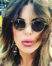 Alba Parietti sexy in costume 10