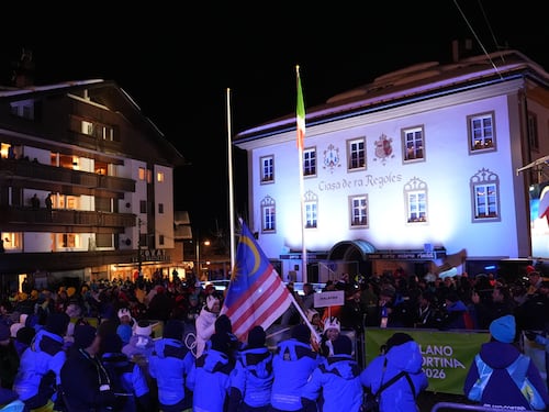 La fiaccola tra i monti di Cortina. Dove le Olimpiadi sono di casa