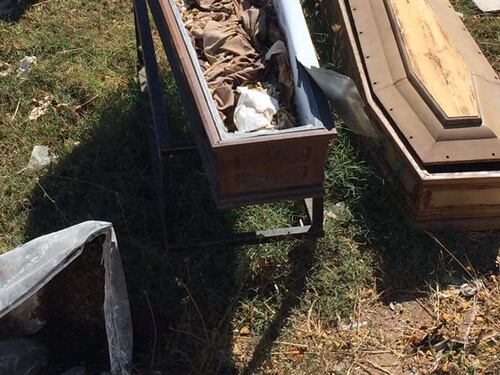 Lecce, discarica abusiva di bare e vestiti di morti
