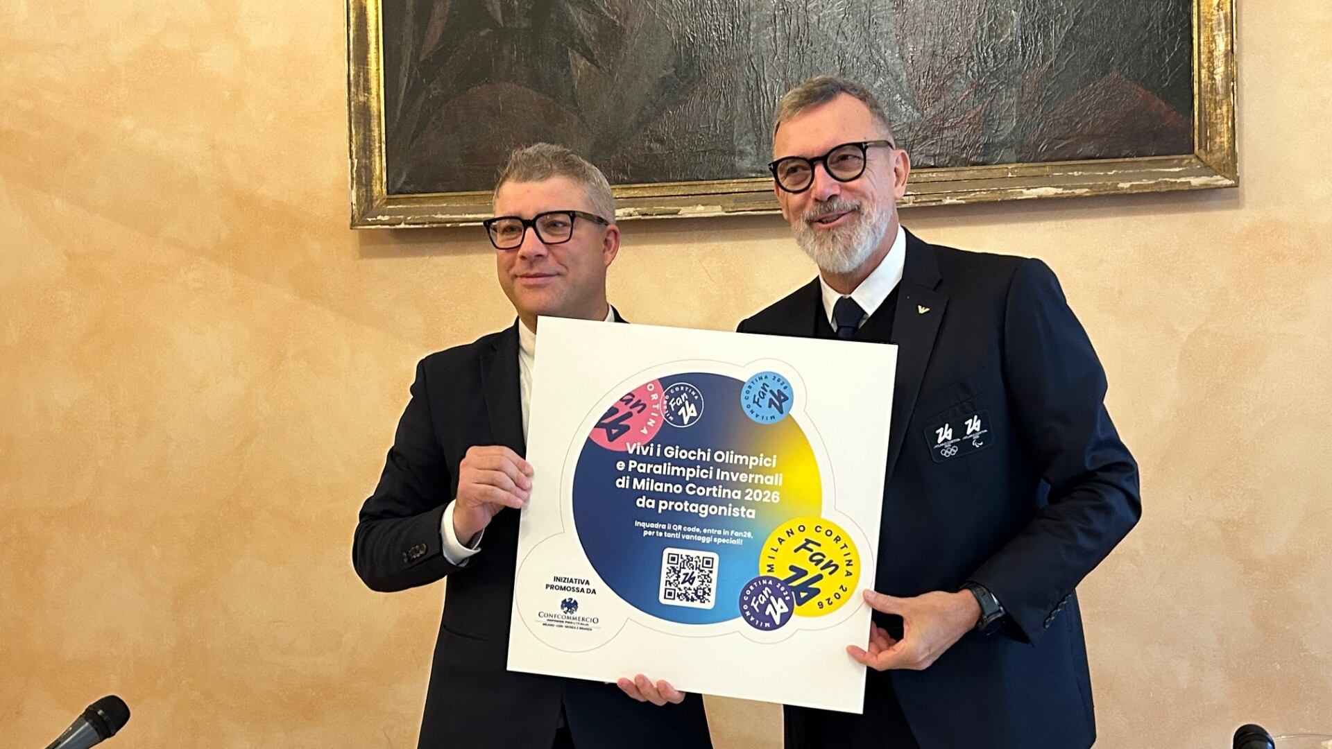 Milano Cortina, i colori dei Giochi sulle vetrine dei negozi