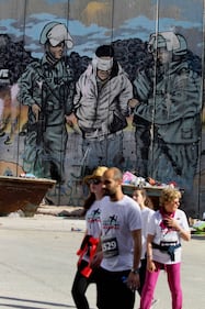 La Palestina corre contro il muro di separazione 14