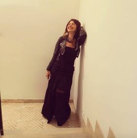 Cristina D'Avena: fisico scolpito in costume 9