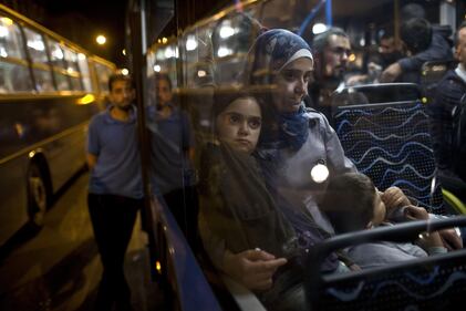 Migliaia di migranti da Budapest a Vienna in autobus 14