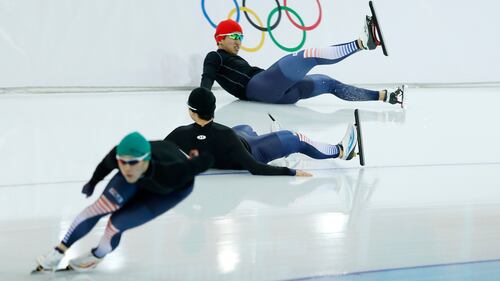 Kim Jun-Ho (top) of South Korea crashes during practice at the Adler Arena
