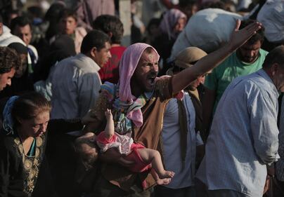 I profughi sfondano il confine tra Turchia e Siria 6