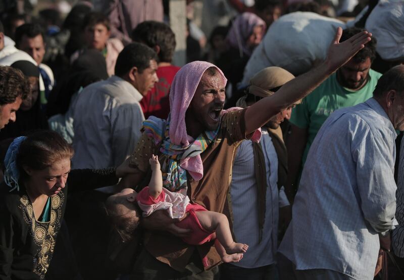I profughi sfondano il confine tra Turchia e Siria 6