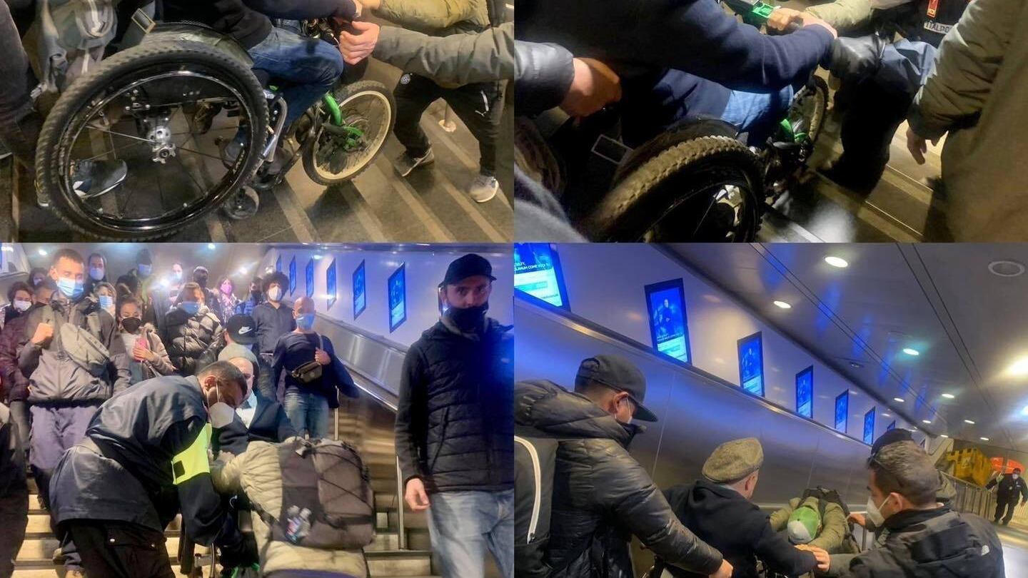 A Roma le scale mobili sono fuori uso e un uomo su sedia a rotelle viene portato in spalla