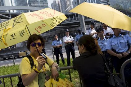 Hong Kong scende in piazza un anno dopo 9