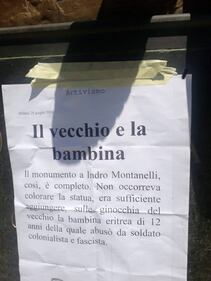 Il fantoccio della bambina eritrea sulle ginocchia della statua di Montanelli 3