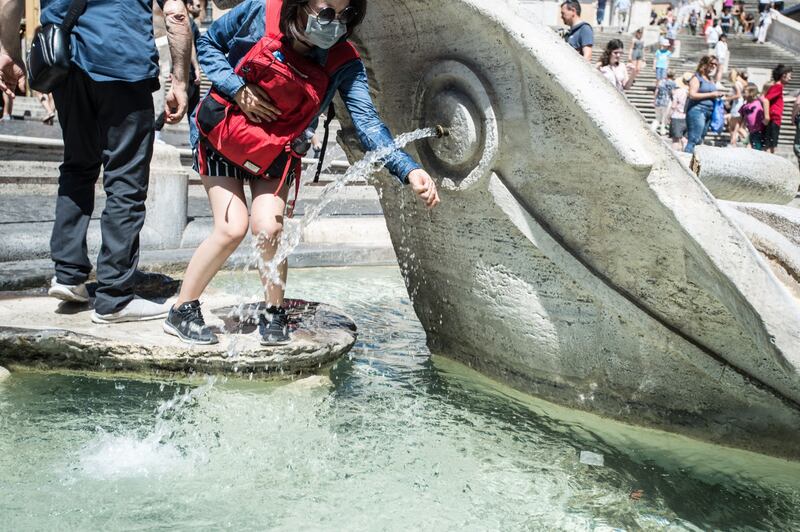 Caldo rovente a Milano e Roma: foto 6