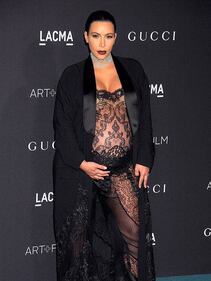 Kim Kardashian, maglietta bagnata senza reggiseno 31