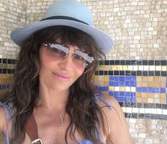 Helena Christensen: lato b perfetto a 48 anni 8