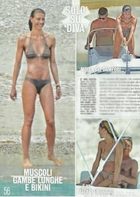 Martina Colombari, topless in barca 3